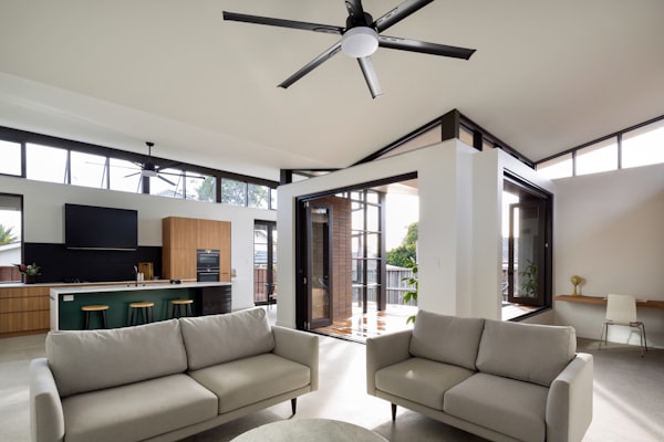 Modern living room with ceiling fan installation